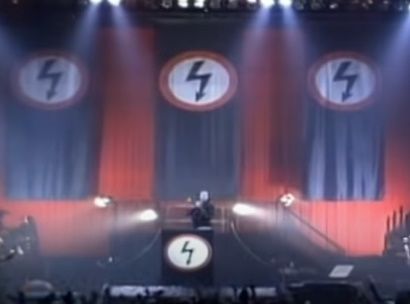 Manson performing the song Antichrist Superstar live from a podium